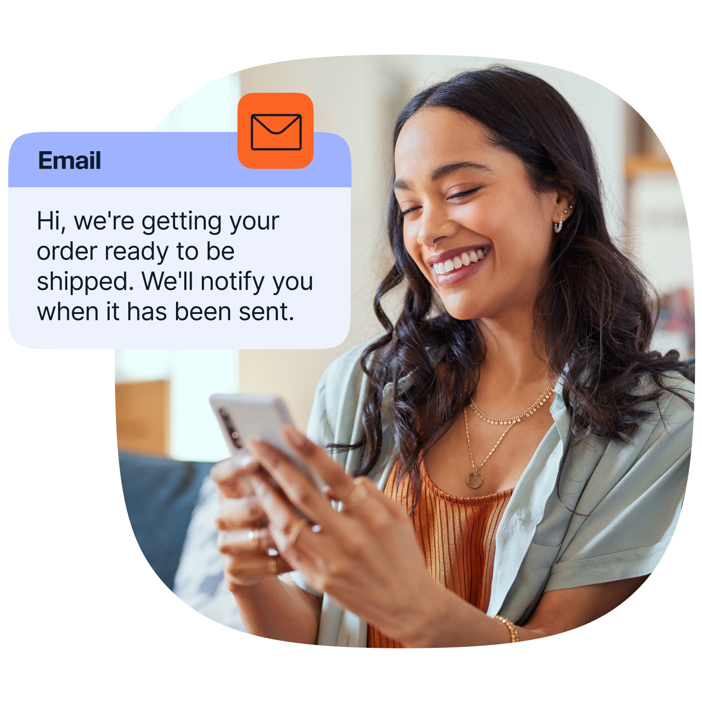 A smiling woman looks at a smartphone. Over the image is an email notification card labeled “Email”. The email message reads: “Hi, we’re getting your order ready to be shipped. We’ll notify you when it has been sent.” An orange envelope icon appears above the email card.