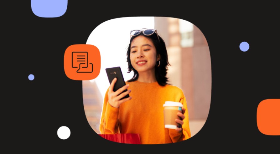Imagem de uma mulher com suéter laranja e celular na mão e um ícone de mensagem.