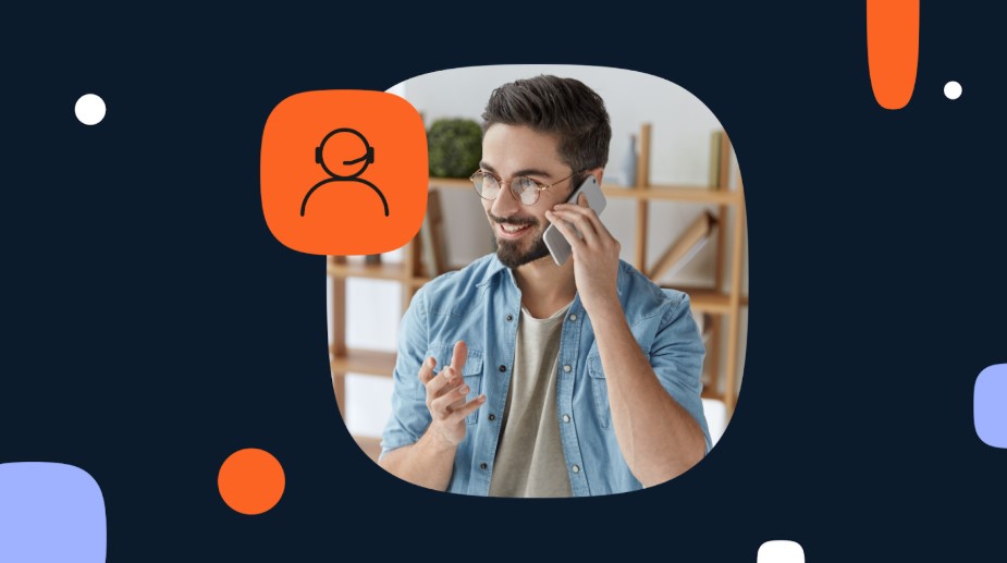 Hombre con barba hablando por teléfono móvil, con icono de asistente de voz alrededor.