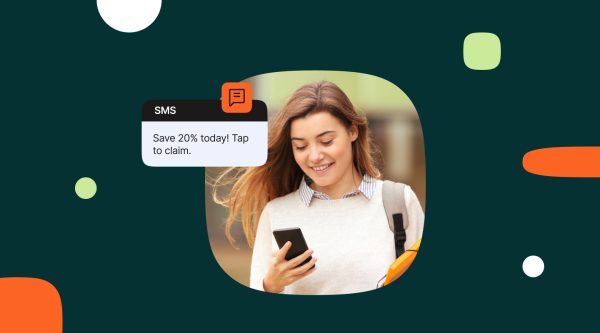 A woman holding a smartphone as an illustration for a blog on How to write SMS for marketing: With examples that convert. An example SMS message bubble displays, "Save 20% today! Tap to claim." The Infobip logo appears in the bottom left corner, set against a dark green background with colorful geometric accents.