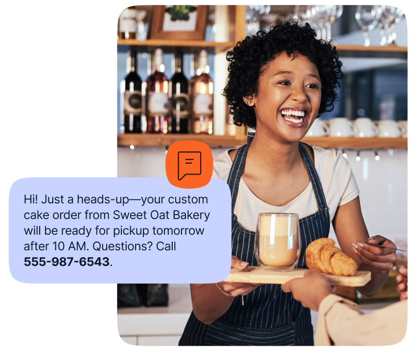A woman working at a bakery smiling. Overlay message that says: Hi! Just a heads-up! Your custom cake order from Sweet Oat Bakery will be ready for pickup tomorrow after 10AM. Questions? Call us!