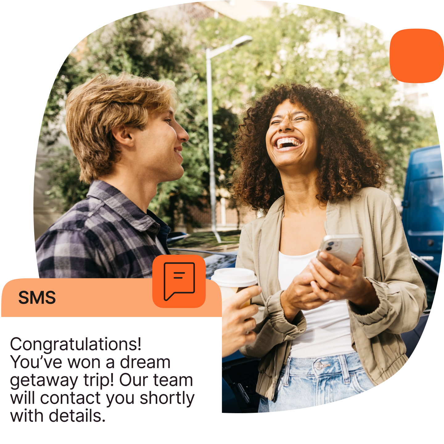 An image showing two people who just read the message that they won an SMS contest. The message overlaying the image says "Congratulations! You've won a dream getaway trip! Our team will contact you shortly with details."
