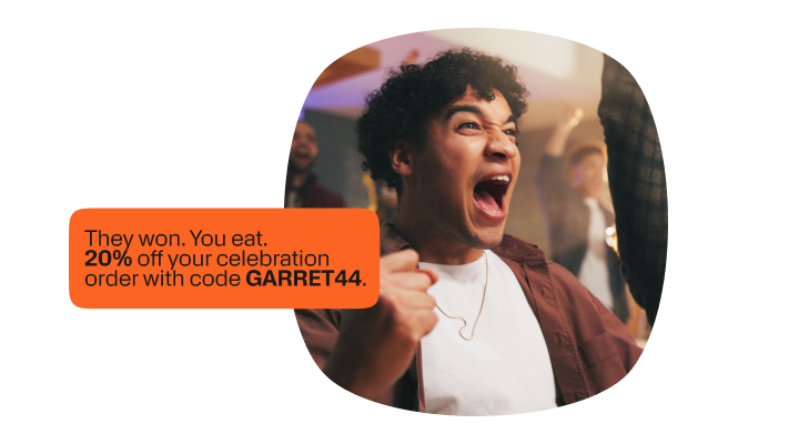 A fan celebrating, next to a phone message reading 'They won. You eat. 20% off your celebration order with code GARRET44.'