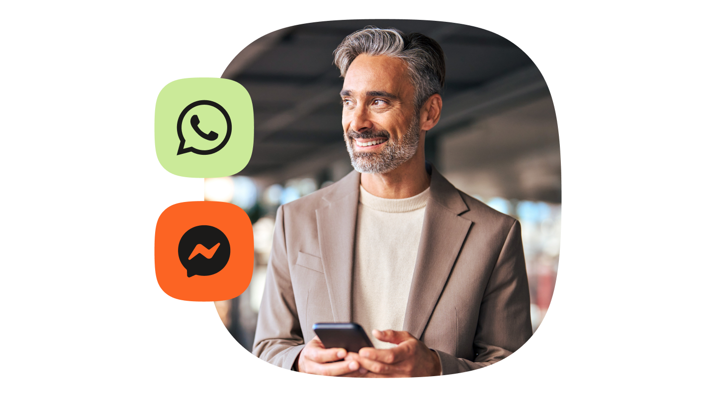 An image of a business man holding a phone. On his left are overlays of logos from both WhatsApp and Messenger.