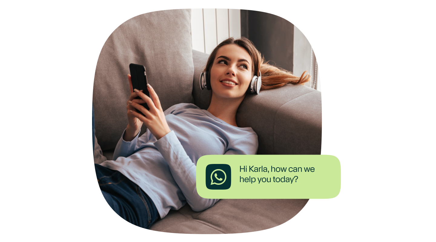 Woman relaxing on a couch with headphones and smartphone, next to a chat bubble saying ‘Hi Karla, how can we help you today?