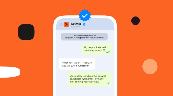 A smartphone mockup showing a WhatsApp conversation with a verified business account named Activist. The background is bright orange with scattered geometric shapes in black and peach. The conversation shows a customer asking about red sneakers and the business responding with product details and a payment link.