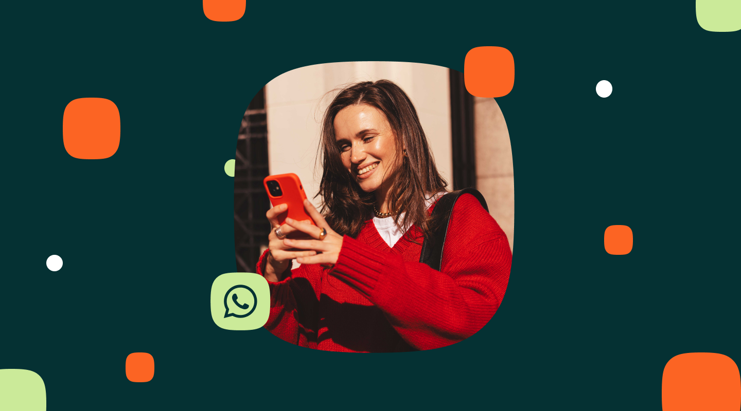 Woman in a red sweater smiling at her phone against a dark green background with decorative shapes and a WhatsApp icon.