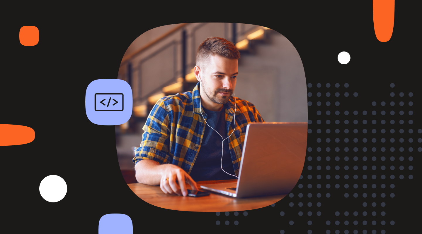 A man wearing earphones and a plaid shirt working on a laptop at a desk, framed inside a rounded rectangle. Dark background with abstract orange, blue, and white graphic elements and a small code icon.