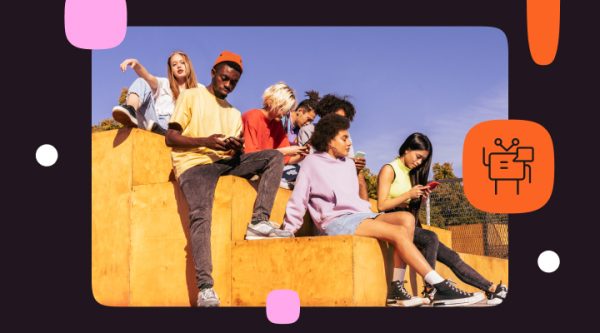 Header graphic showing a group of five young adults sitting on stacked yellow blocks outdoors while using their smartphones. The design features a dark purple background with decorative pink, white, and orange shapes. An orange square icon with a robot symbol appears on the right side, representing conversational AI.