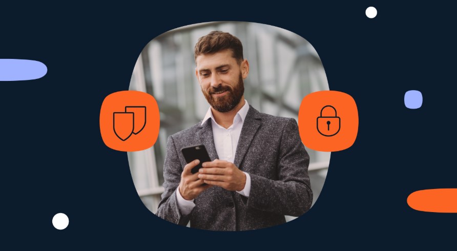 Hombre con ropa formal y celular en las manos, imagen con ícono de seguridad.