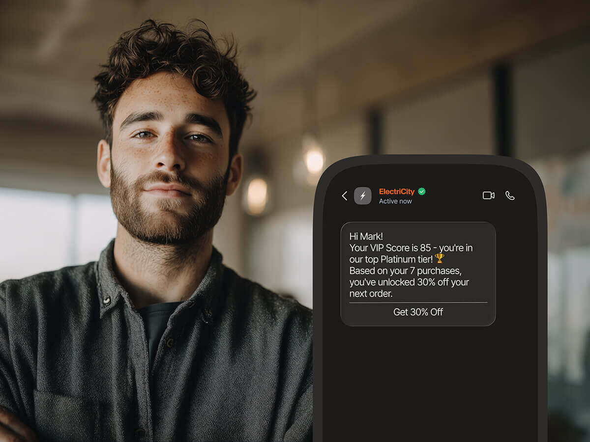 A phone displaying a loyalty programme message from ElectriCity notifying a customer they've reached Platinum VIP status and unlocked 30% off their next order.