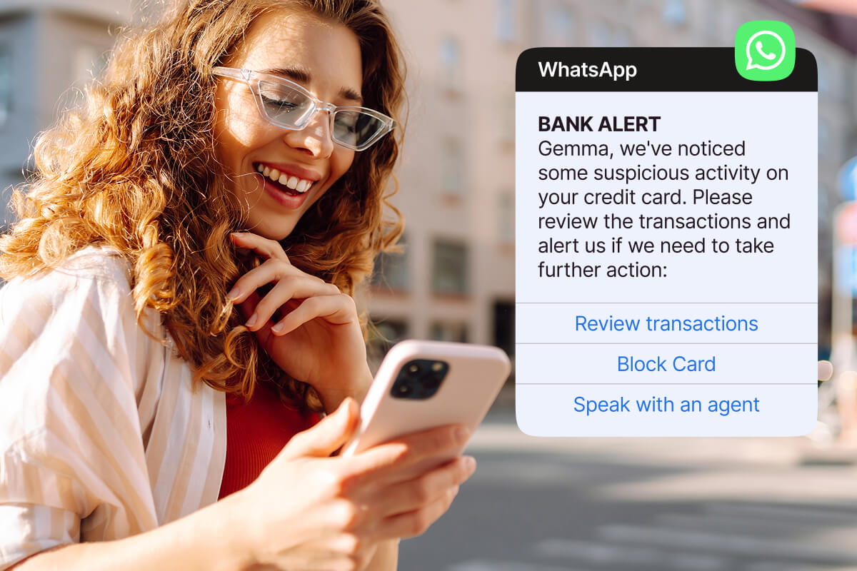 Woman checking her phone beside a WhatsApp bank alert about suspicious credit card activity, with options to review, block card, or contact an agent.