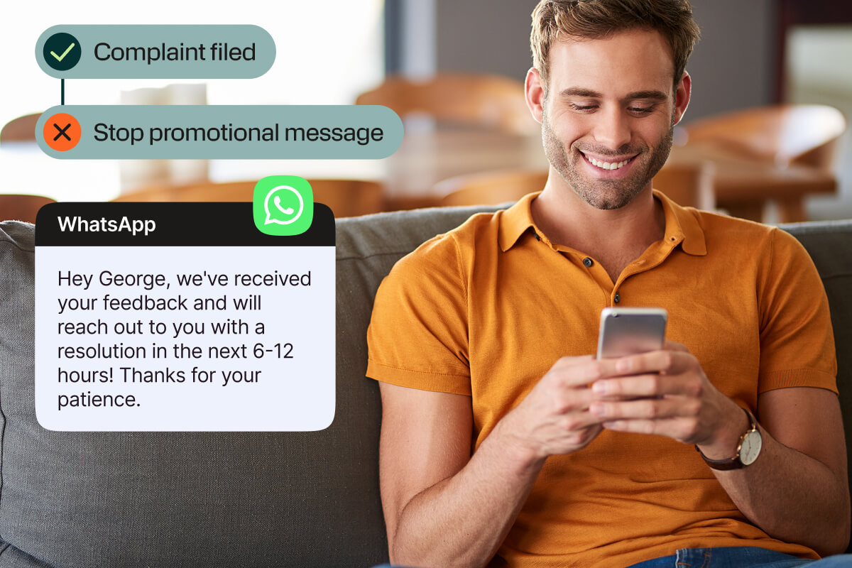 Man on a couch using a smartphone beside a WhatsApp confirmation of a filed complaint and request to stop promotional messages.