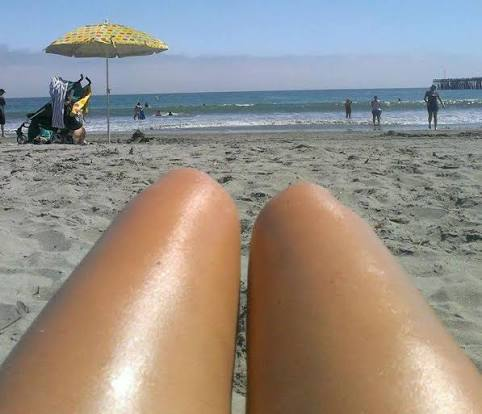 An image showing what could be a pair of legs on a beach or a pair of sausages - both AI and humans would find it difficult tell.