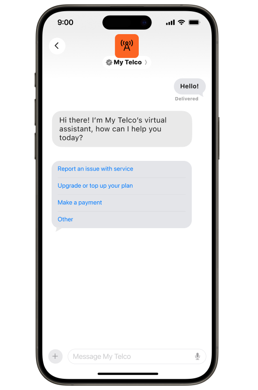 Smartphone screen showing an Apple Messages conversation with verified business “My Telco.” The user message says “Hello!” A reply reads, “Hi there! I’m My Telco’s virtual assistant, how can I help you today?” Below are selectable options: “Report an issue with service,” “Upgrade or top up your plan,” “Make a payment,” and “Other.”