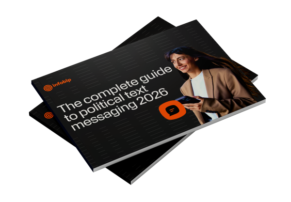 Two stacked copies of an Infobip eBook titled "The Complete Guide to Political Text Messaging 2026," featuring a smiling woman in a tan blazer holding a smartphone, with an orange chat bubble icon on the cover.