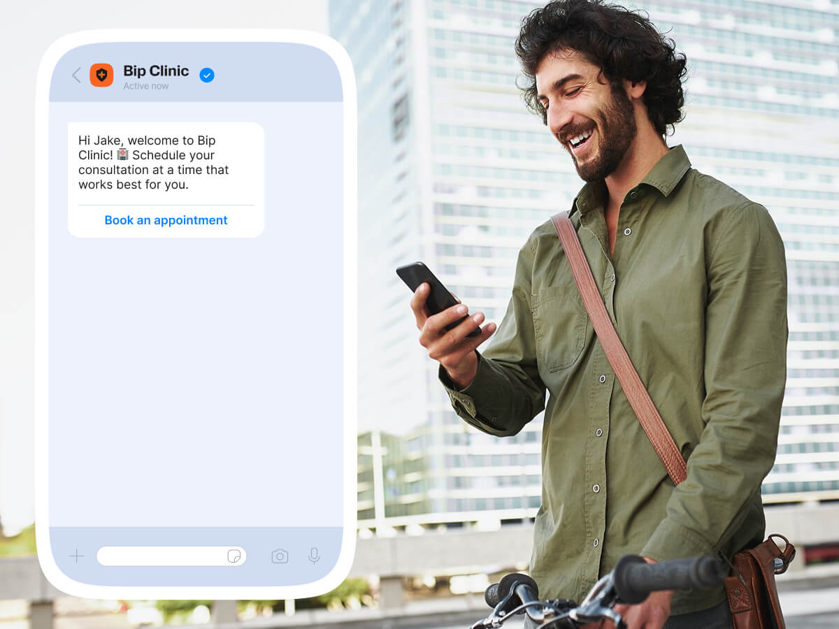 Man checking healthcare appointment invitation message on mobile from clinic business account